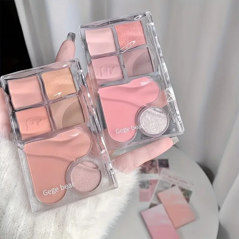 2 matte eyeshadow palettes held on a hand branding gege bear clearly visible 
