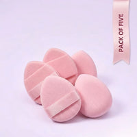 pack of mini beauty blender in baby pink color against the faint blue background 