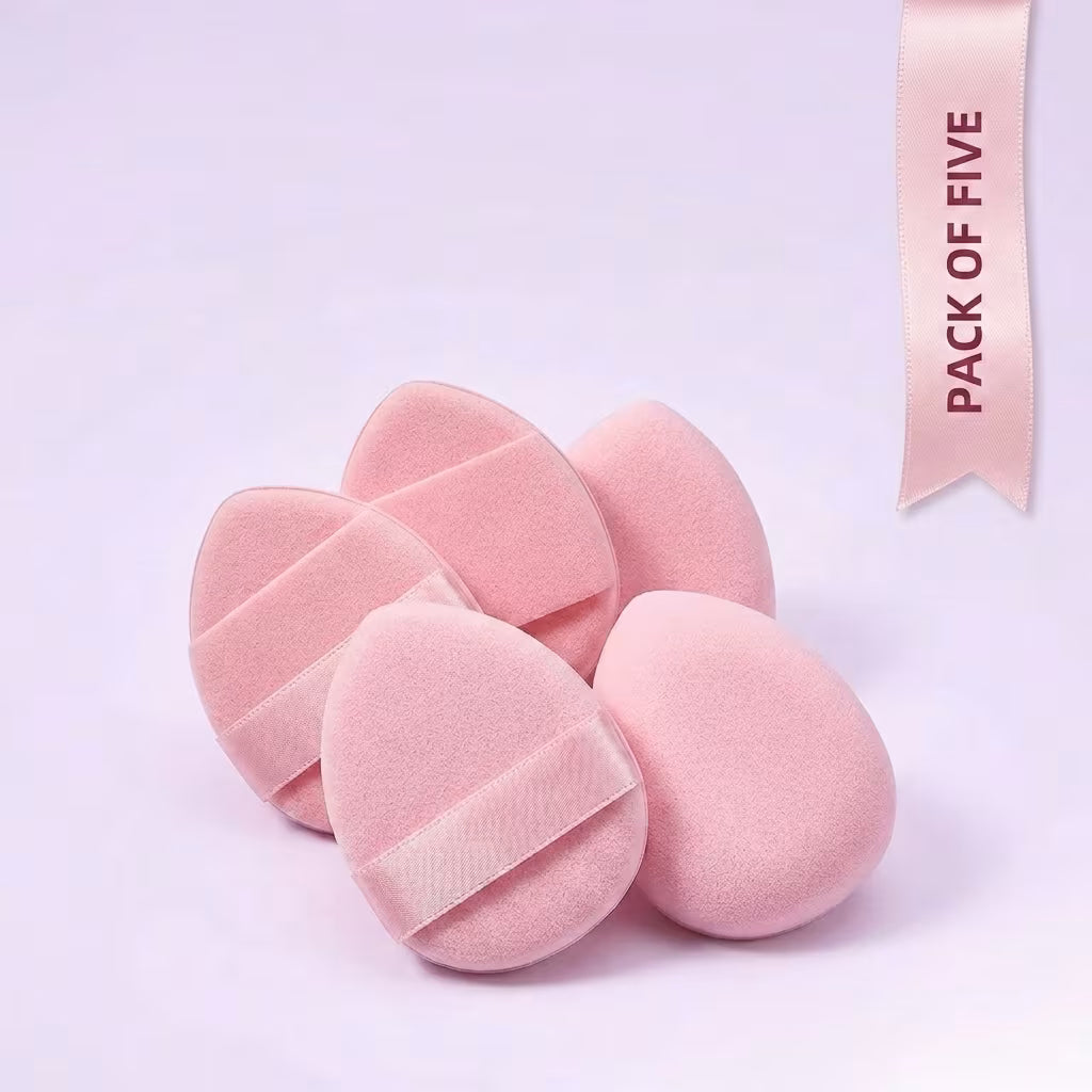 pack of mini beauty blender in baby pink color against the faint blue background 