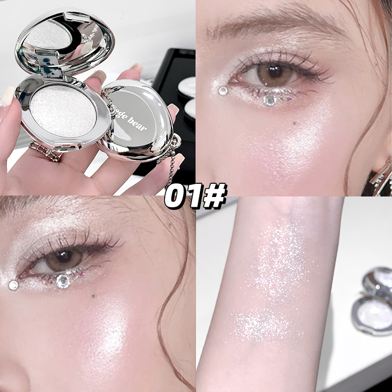 Makeup product with close-up applications on eyes and arm, featuring 'gege bear' brand.