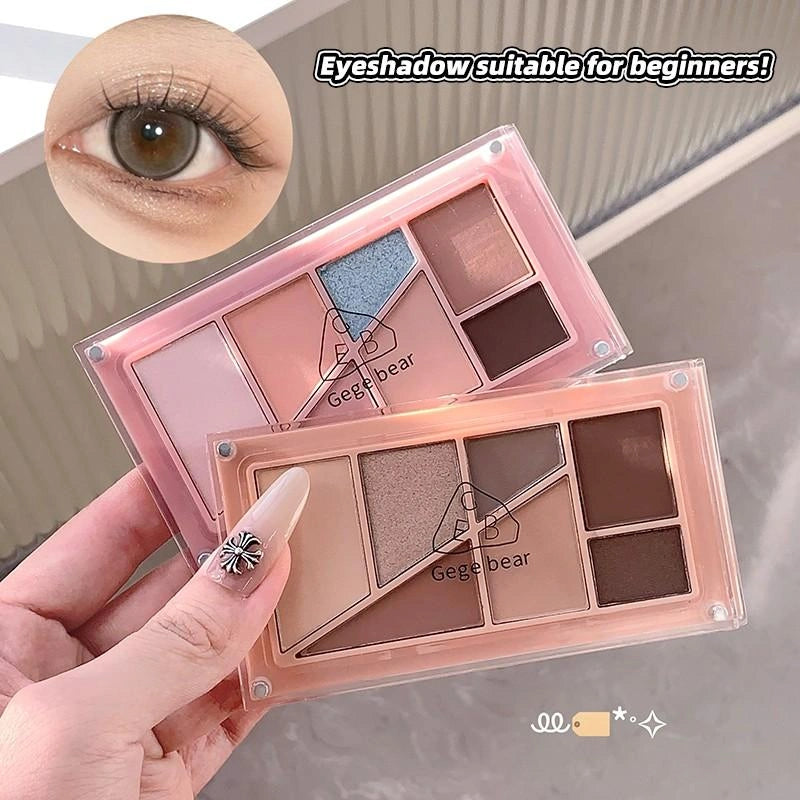 Hand holding four two makeup palettes with different colors, branded 'GEGE BEAR'.