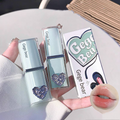 Lipstick with heart design and 'Gege bear' branding, held by a hand.