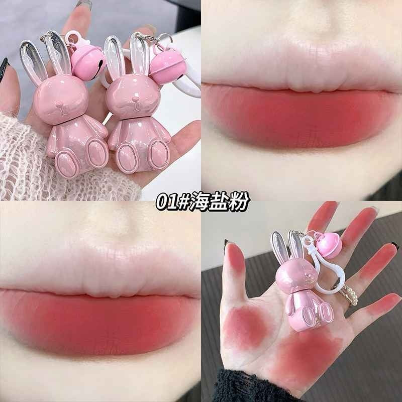 Collage of a pink bunny-shaped lip balm with close-ups on lips and hands.