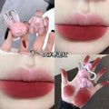 Collage of a pink lip gloss with rabbit design, applied on lips and hand.