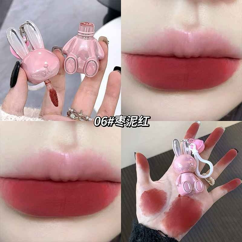 Collage of a pink lip gloss with rabbit design, applied on lips and hand.