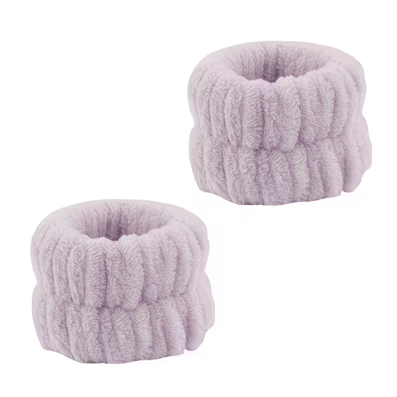 set of purple wristbands  on a white background 