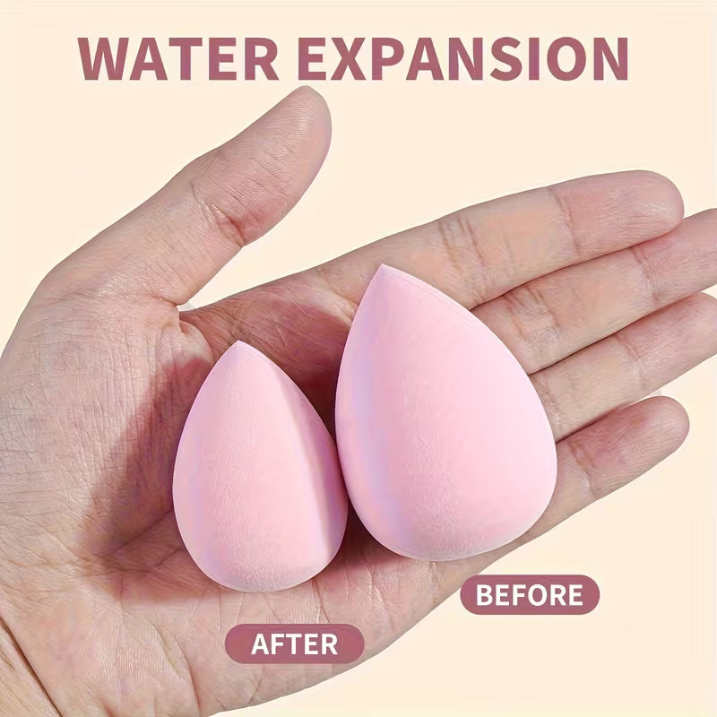 size difference of beauty blender showing before and after with a pink egged beauty sponge on a hand 