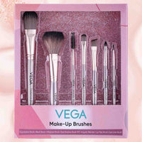 Set of Vega makeup brushes in a decorative box on a pink background