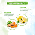 Hero ingredients with turmeric, lemon, and vitamin C on a light background
