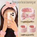 wash wrist straps and headband in a baby pink color and a girl putting it on whilte using a phone 
